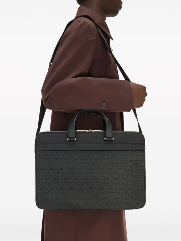 Ferragamo Black Monogram Embossed Leather Briefcase | Browns Laptop Bags & Briefcases