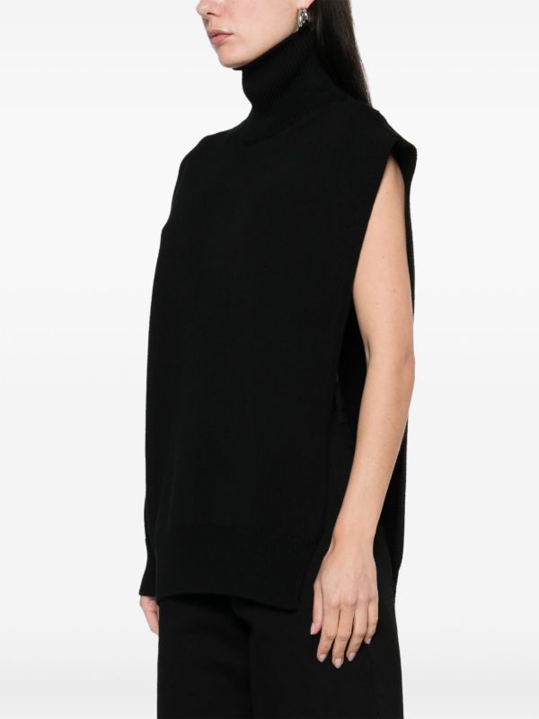 Alaïa Black Single-Sleeved Sweater | Browns Knitted Sweaters