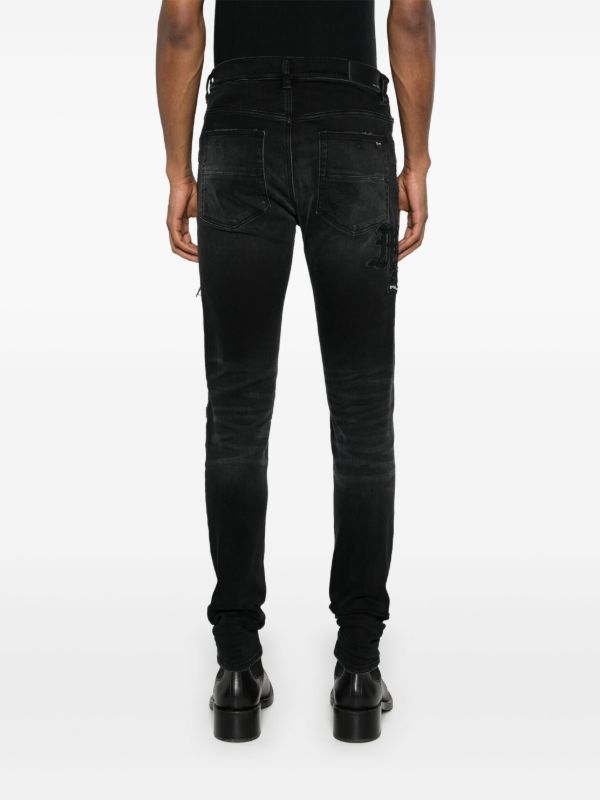 AMIRI Black Ripped Skinny Jeans | Browns Skinny Jeans