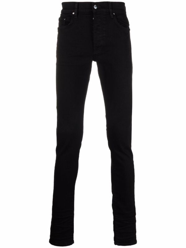 AMIRI Black Stack skinny jeans | Browns Skinny Jeans