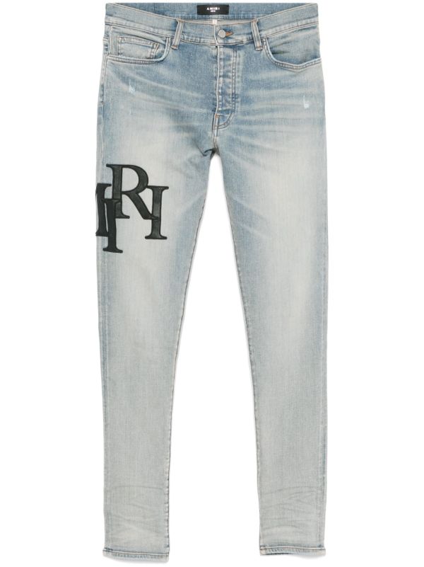 AMIRI Staggered-Logo Jeans | Browns Skinny Jeans