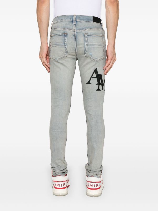 AMIRI Staggered-Logo Jeans | Browns Skinny Jeans