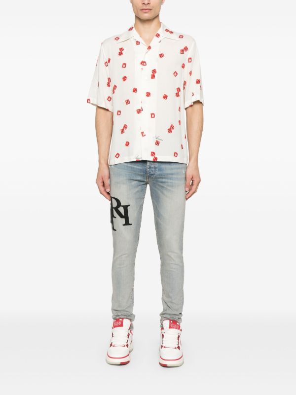 AMIRI Staggered-Logo Jeans | Browns Skinny Jeans