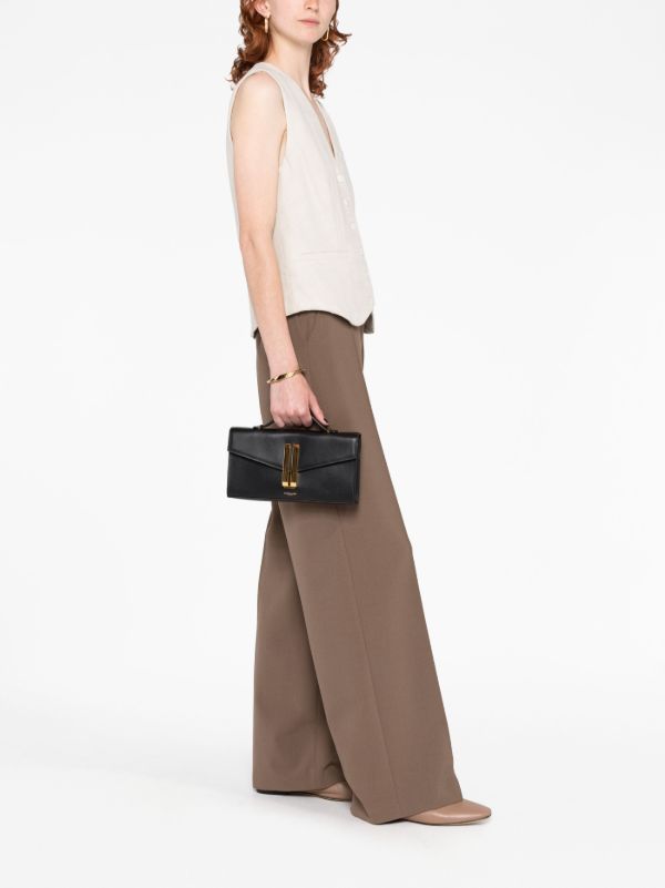 DeMellier Black Vancouver Leather Clutch Bag | Browns Clutch Bags