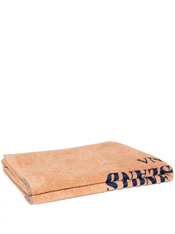 Stone Island logo-embroidered beach towel | Browns Beach Cover-Ups