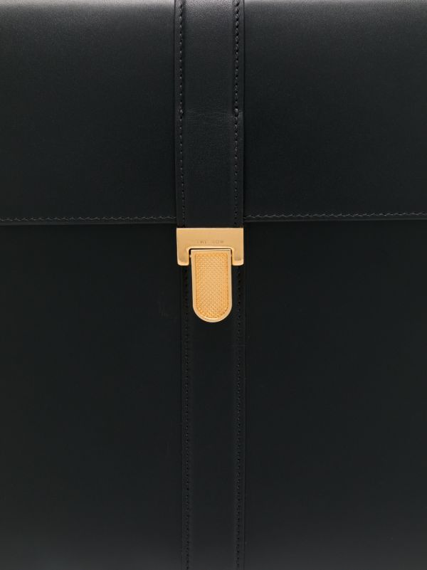The Row Black Leather Clutch Bag | Browns Clutch Bags