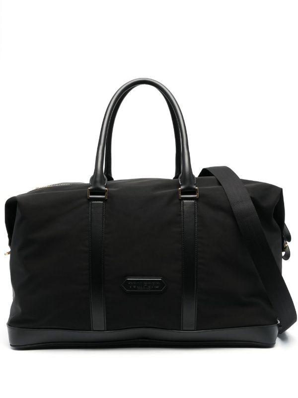 TOM FORD Black logo lozenge holdall | Browns Luggage & Holdalls