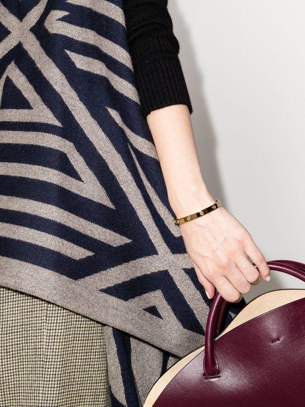 Tory Burch Gold Tone Miller Hinge Stud Bangle | Browns Bracelets