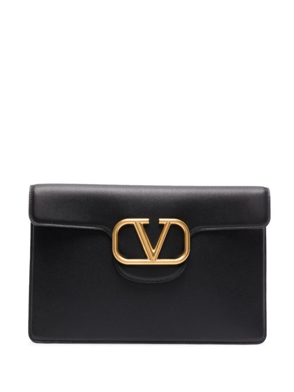 Valentino Garavani Black Locò Leather Clutch Bag | Browns Clutch Bags