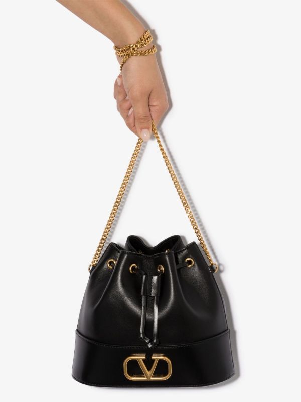 Valentino Garavani Black VLOGO mini leather bucket bag | Browns Bucket Bags