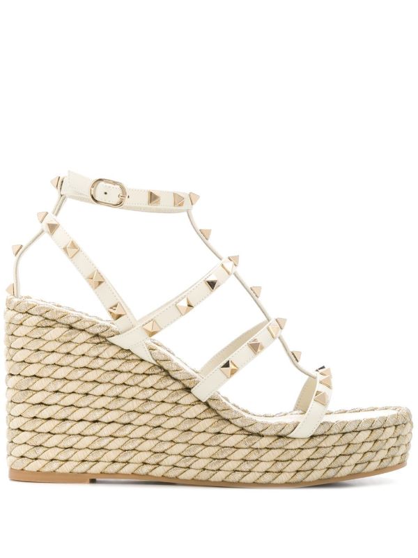 Valentino Garavani neutral 95 rockstud wedge sandals | Browns Sandals