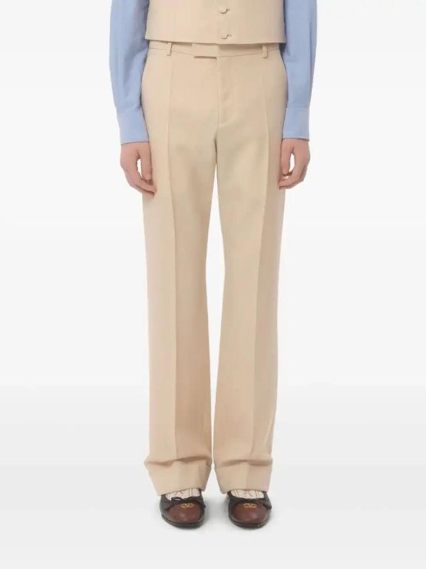 Valentino Garavani Turn-up Wool Trousers | Browns Tailored Pants