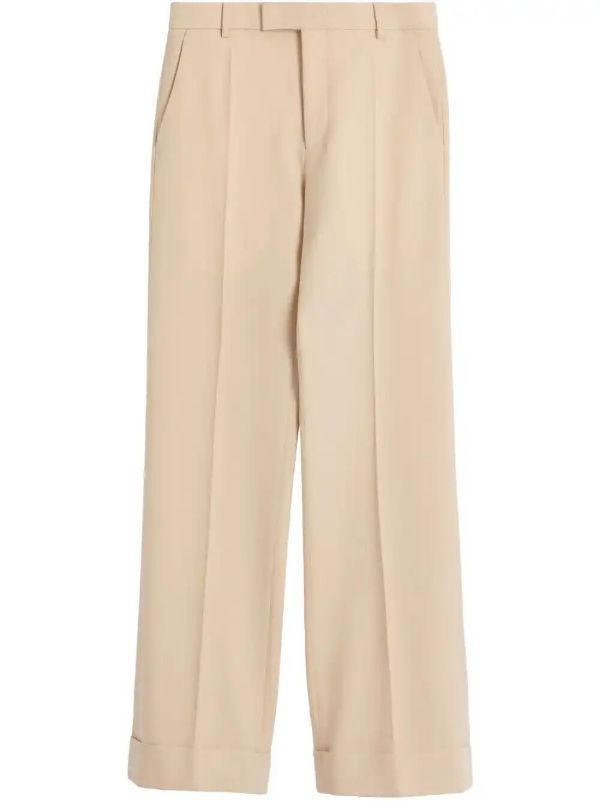 Valentino Garavani turn-up wool trousers | Browns Tailored Pants
