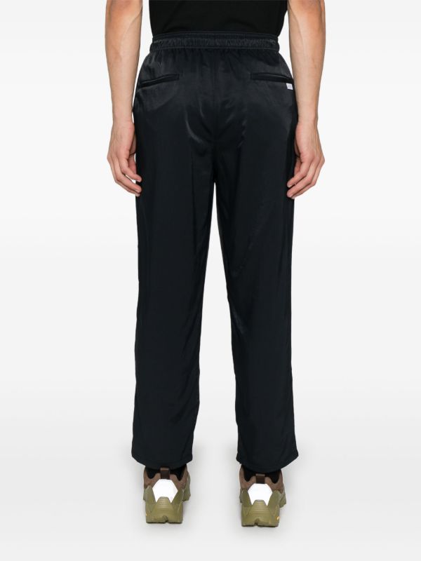 WTAPS Black Tapered Trousers | Browns Tapered Pants
