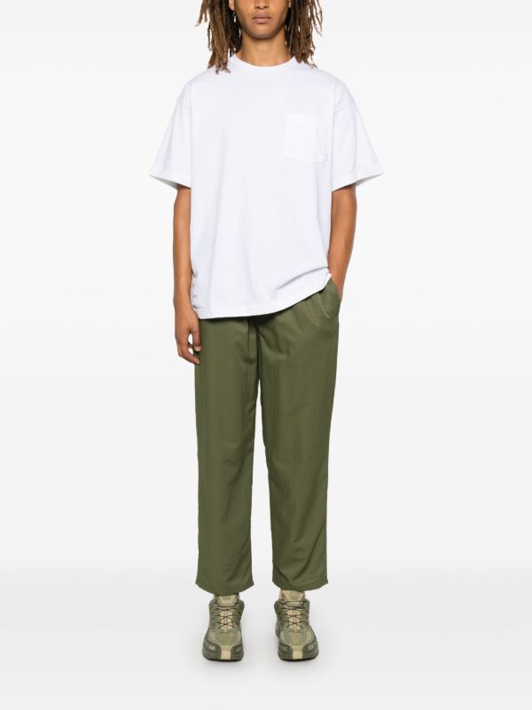 WTAPS Green Tapered Trousers | Browns Tapered Pants