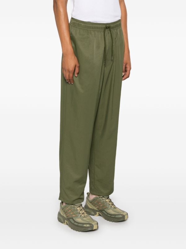 WTAPS Green Tapered Trousers | Browns Tapered Pants