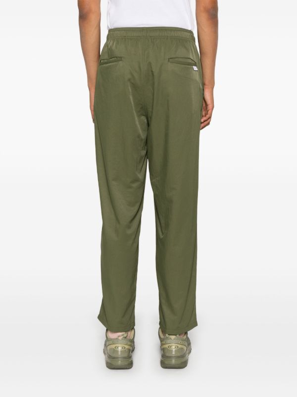 WTAPS Green Tapered Trousers | Browns Tapered Pants